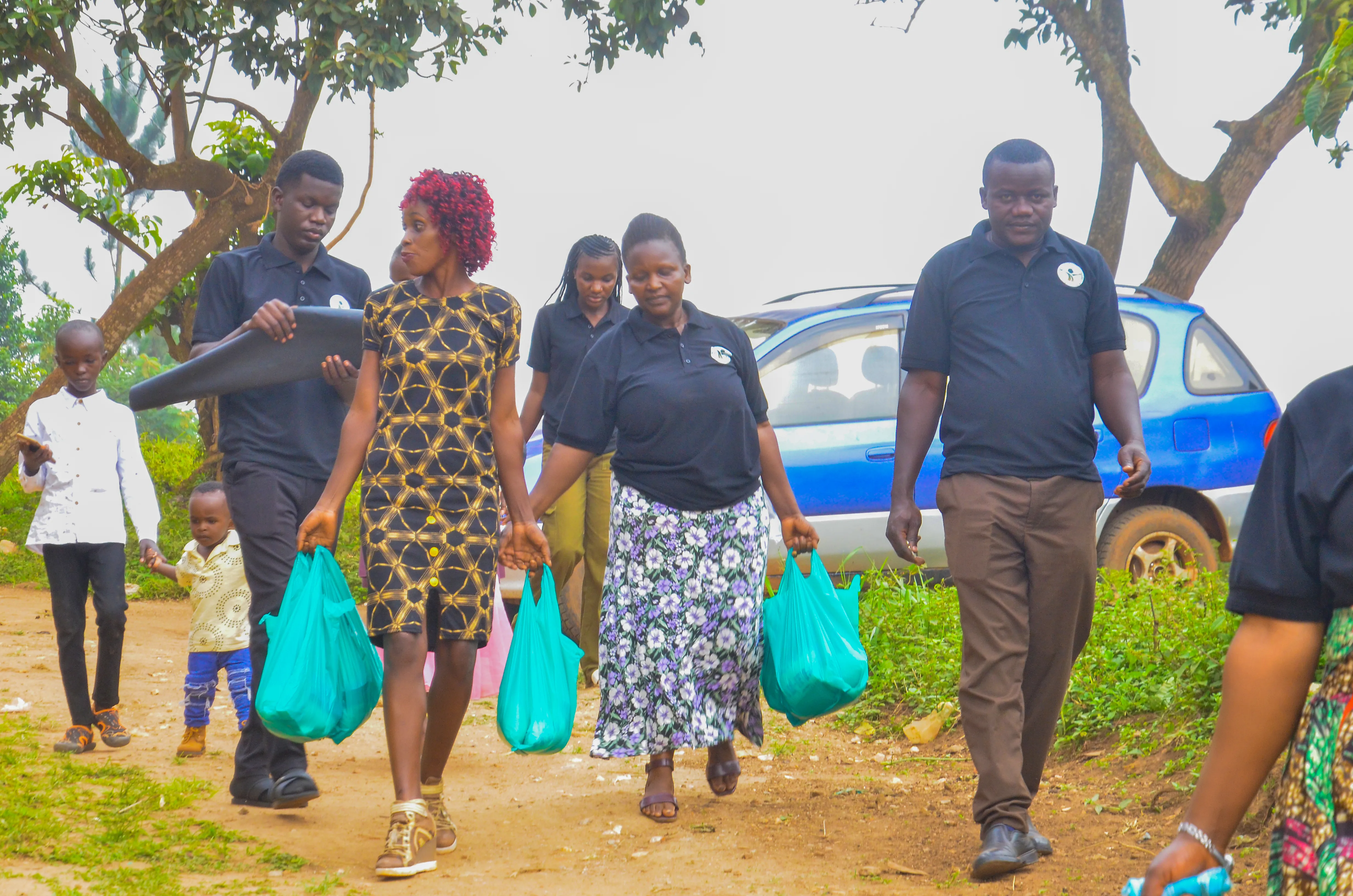 Volunteers and families walking together